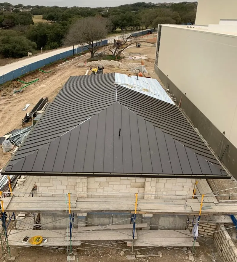 Metal roof new construction with scaffolding in Oakbrook