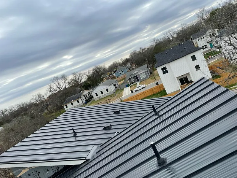 Standing seam metal roof panels with vents for Skylight Repair in Oakbrook
